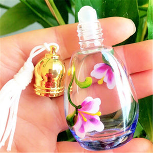 MINI Botella de fragancia de vidrio 10ml Flower Draw Color Frascos de perfume con tapas de rodillo Las mujeres recargables favorecen DC749